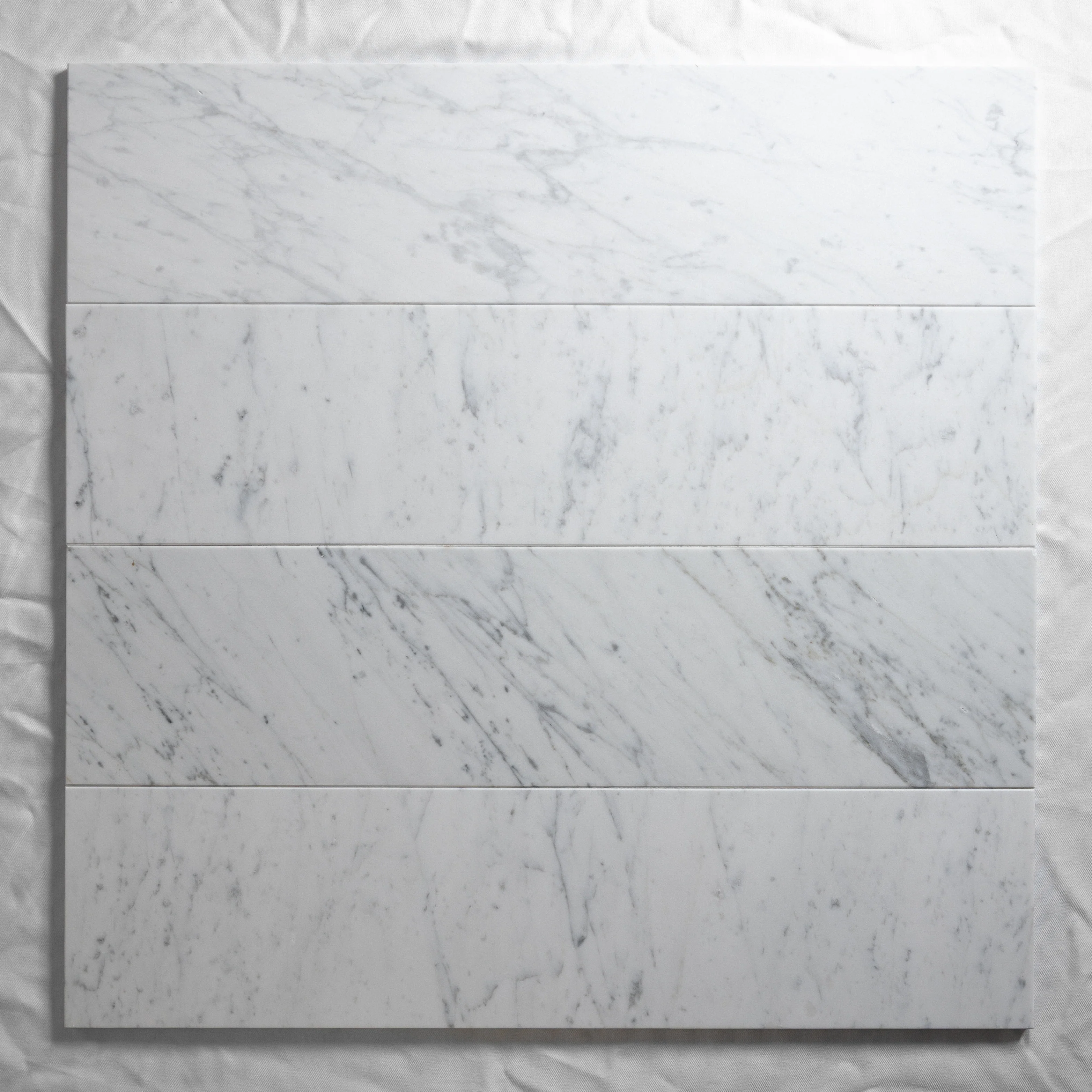 Venatino Carrara 6"x24"